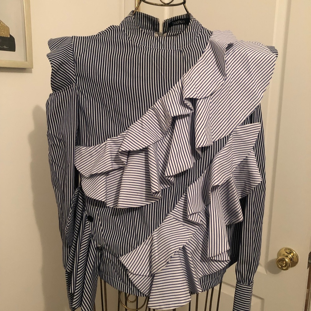 Blue and white pinstripe top with ruffle front zipper in the back
